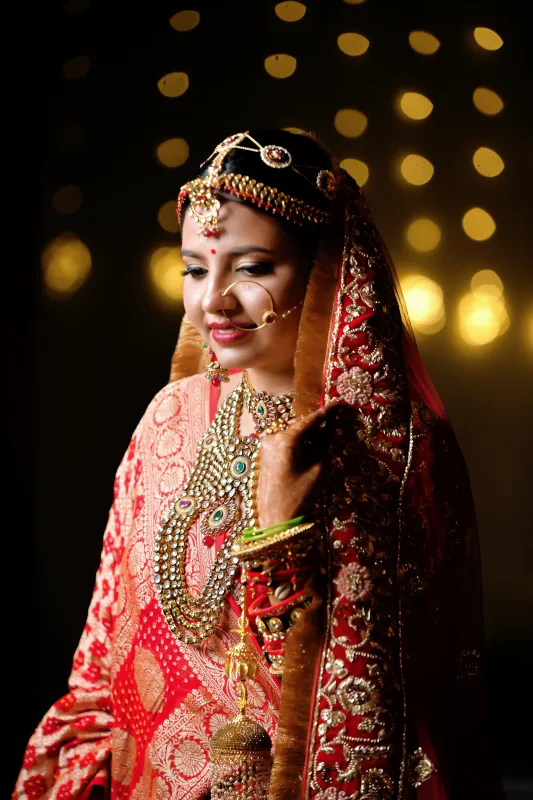 Close-up portrait highlighting makeup, dupatta, and jewellery